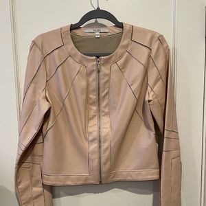 Guess leather jacket in a peach color. In excellent condition. Size large